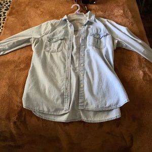 Light denim shirt in great condition. Smaller fit.